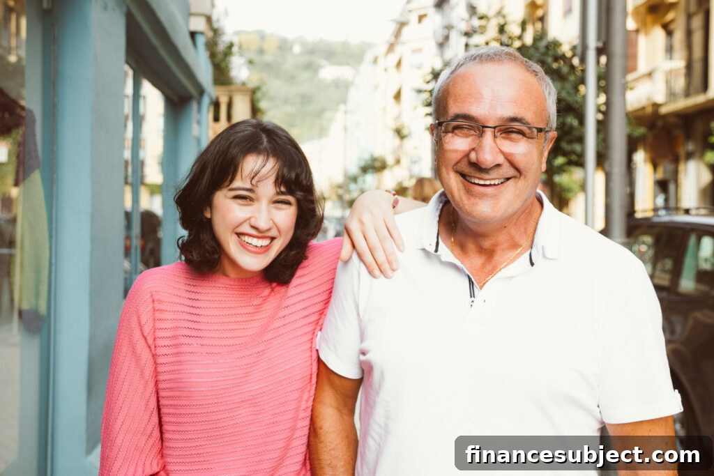 A father who purchased real estate for his child smiles at the camera.