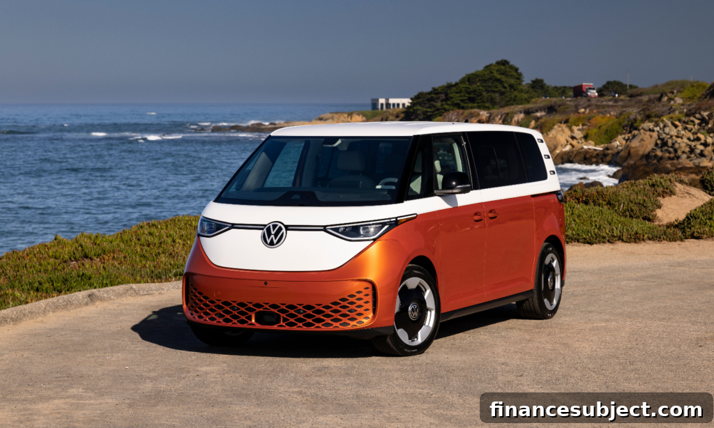 A Volkswagen ID Buzz mini van parked beside an ocean