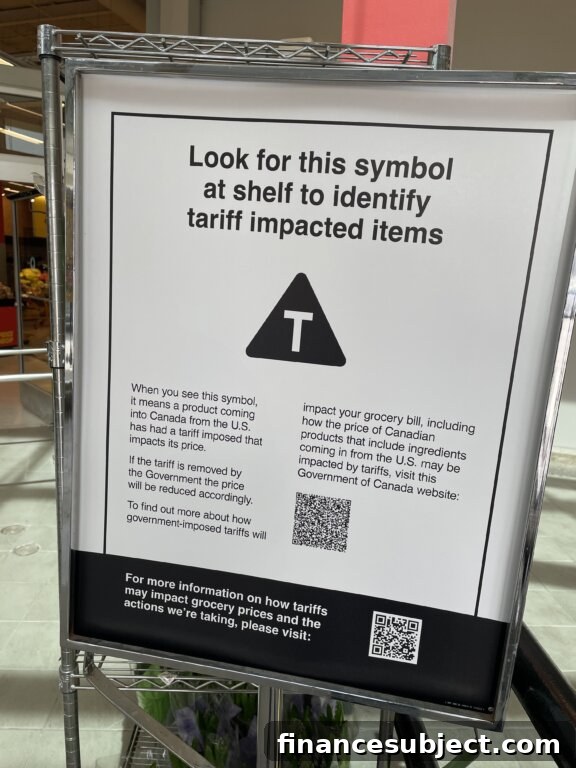 A sign with details about the "T" symbol indicating products affected by tariffs.